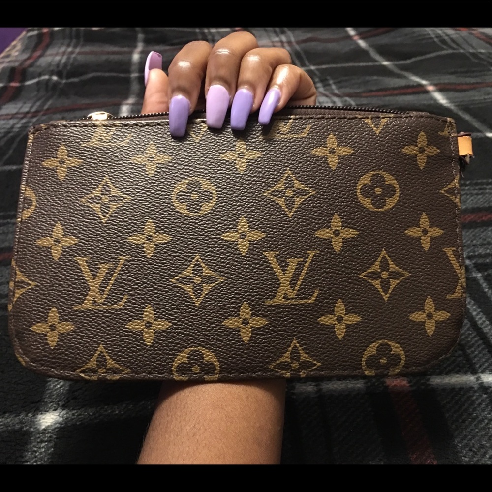 A cute small Louis Vuttion pouch